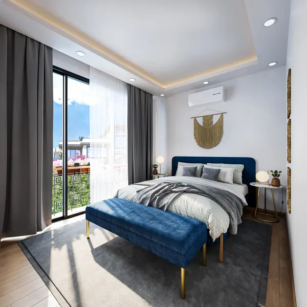 Bedroom with a blue upholstered bed and full-height glazing to a balcony