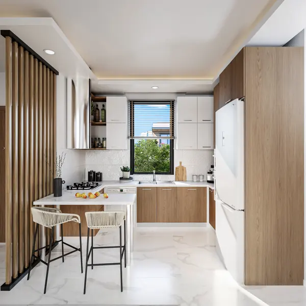 Separate kitchen with a breakfast bar, two stools and a timber slatted screen