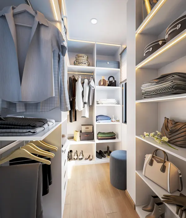 Walk-in wardrobe room with fitted shelving, hanging rails and LED strip lighting