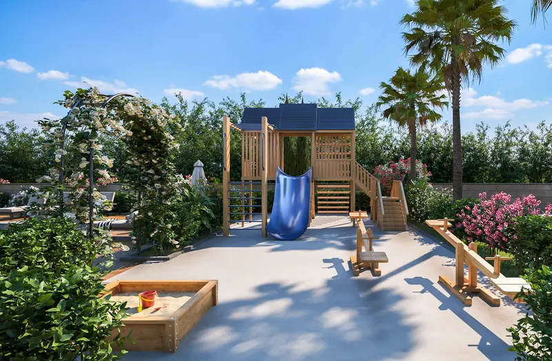 Children's playground with a timber climbing frame, slide, sandpit and see-saws