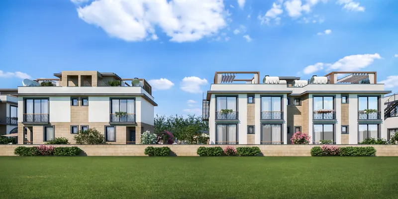 Rear elevation of two blocks with roof-terrace pergolas and balconies over a lawn