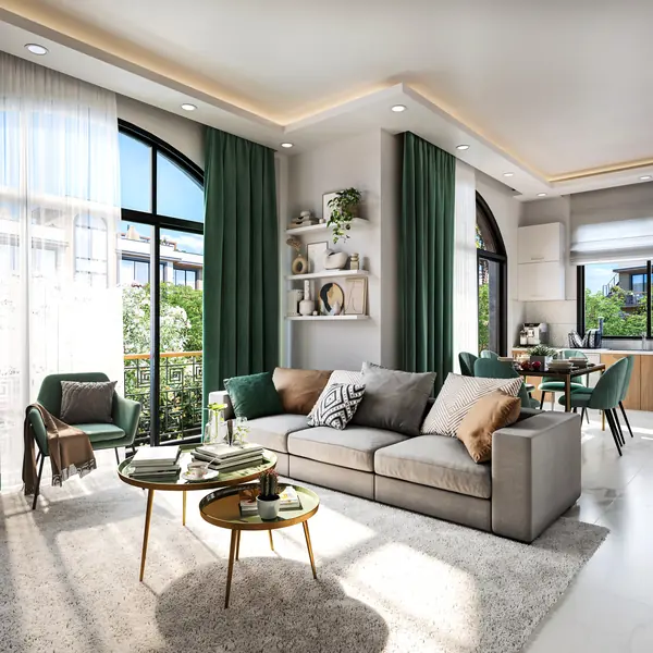 Open-plan living room with an arched window, deep green curtains and a grey sofa